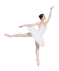Ballerina making ballet arabesque at white background © Prostock-studio