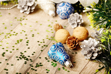 Fototapeta na wymiar Christmas background of nuts stripes and decorations