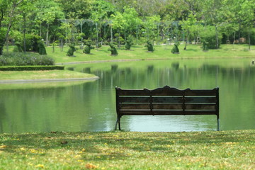 empty benches in the park during the day.