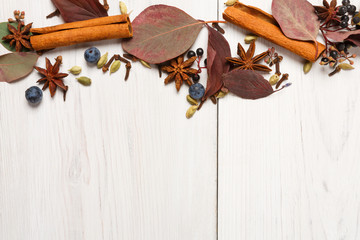 Spices assortment on white wooden background