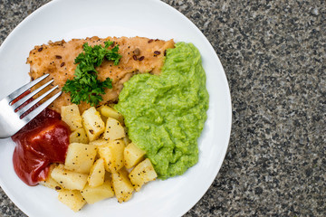Breaded Haddock Fillet With Parmentier Potatoes And Pea Puree