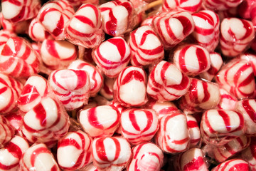 Fototapeta na wymiar Background of colorful red and white candy