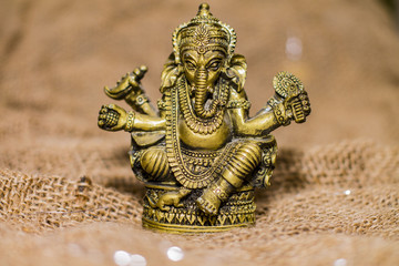 Fototapeta na wymiar golden statue of the Hindu god Ganesh