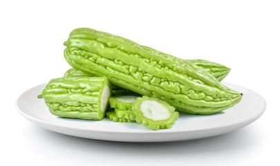 Bitter melon in plate isolated on a white background