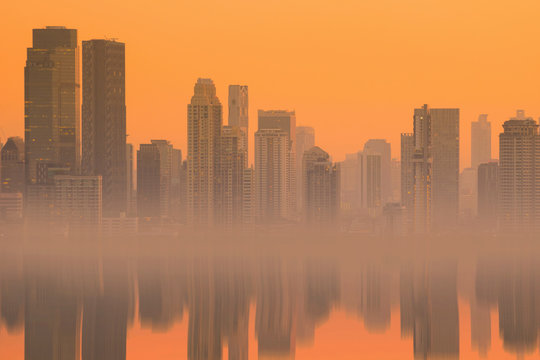 City abstract reflection at dusk warm tone.