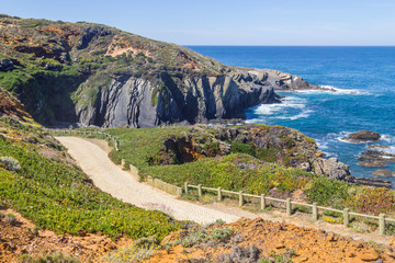 Trekking route and cliffs in the Beach in Almograve