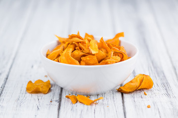Portion of Sweet Potato Chips , selective focus