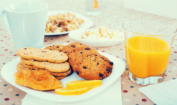 still life of milk, biscuits, porridge from cereals