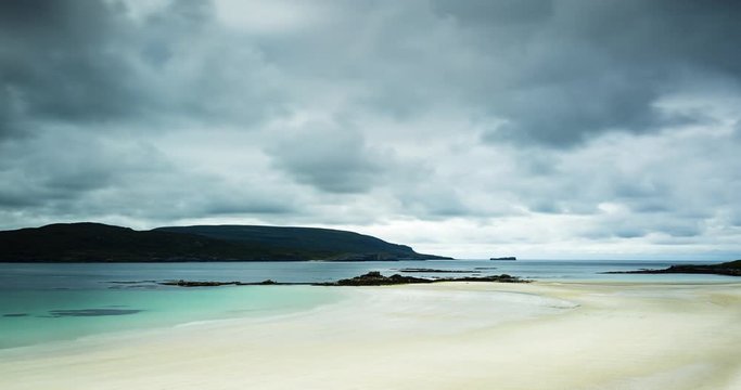 timelapse of clouds moving over the white sands of faraid head in durness near cape wrath in the north west of scotland