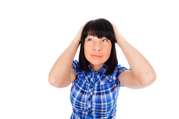 Gesture Portrait of Mature Woman Has Shocked or Surprised, holding her head both hands. Dressed in shirt blue color, isolated on white. wide angle