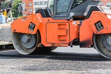 Fototapeta na wymiar New asphalt laying