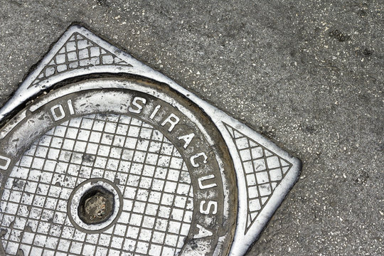 Manhole cover in Syracuse, Italy