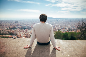 Fototapeta na wymiar young man enjoying Barcelona city view