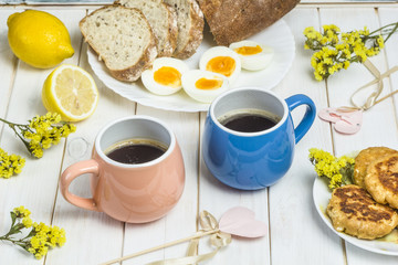 Two cups of coffee. Breakfast.