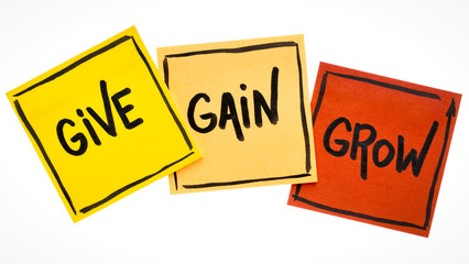 give, gain and grow concept in sticky notes