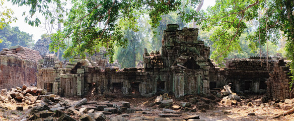 Od ruins of Preah Khan Temple in Siem Reap, Cambodia. Preah Khan has been left largely unrestored, with trees and other vegetation growing among the ruins. © sonatalitravel