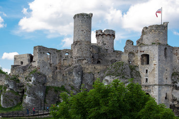 Fototapeta na wymiar Photography of Ruins Ogrodzieniec Castle at sunny summer day. Poland Ogrodzieniec city