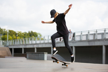 Skater jumping in skate park