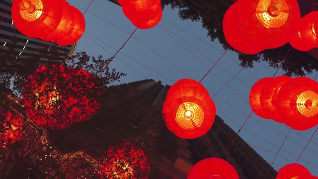 Camera moving around red paper lantern. Chinese new year red paper lantern decoration in Hong Kong city.