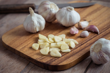 Garlic on wooden cutting board