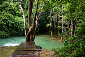 wooden bridge at Huay Mae Kamin waterfall, Kanchanaburi, Thailand