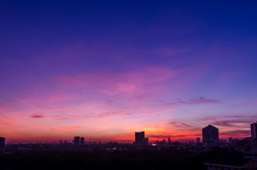 Amazing sunset skyscape with silhouette city town with copy space, Bangkok, Thailand