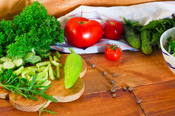 Mediterranean food healthy lifestyle concept: Italian vegetables herbs. pepper tomatoes & parsley. on wooden background