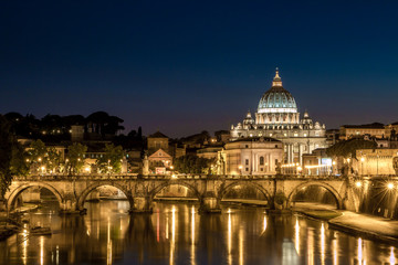 View of Rome by night with the Vatican and St Peter's basilica