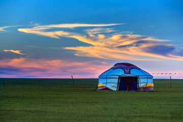 Mongolian traditional houses in immense grassland.They call these tents as ''Yurt''