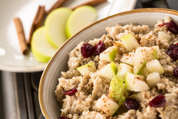 Close Up Oatmeal With Apples And Cranberries And Cinnamon