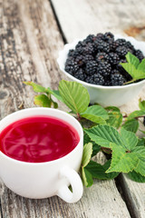 Cup of tea and blackberry
