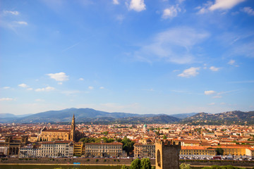 Fototapeta na wymiar Beautiful cityscape skyline of Firenze (Florence), Italy, with the bridges over the river Arno, Famous View of Florence with sunny day, blue sky from Piazzale Michelangelo, Florence, Italy