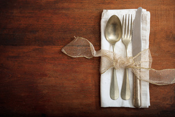 Table setting on wooden background