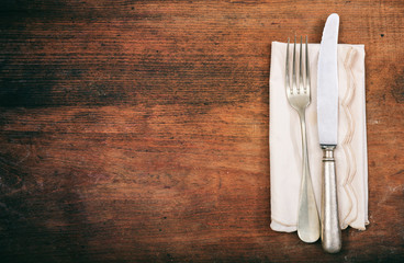 Table setting on wooden background