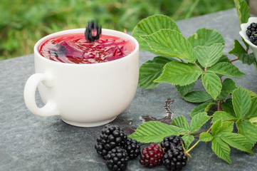 Cup of tea and blackberry