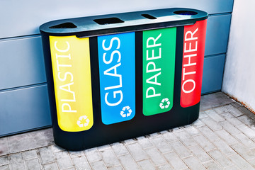 Multicolored bin for separate waste collection.