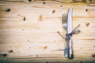 Table setting on wooden background