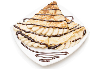 Crepes with chocolate cream and banana