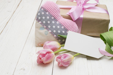 beautiful tulips with gift box. happy mothers day, romantic still life, fresh flowers.