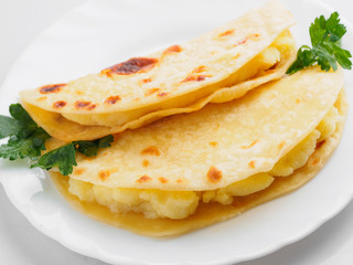 kystybyi tatar potato pie on the white plate