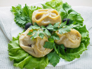 Beef manta dumplings with meat on the plate