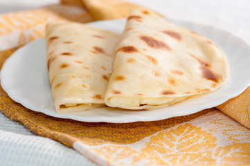 kystybyi tatar potato pie on the white plate