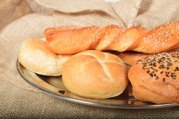 Crunchy bagels and baguette with seeds