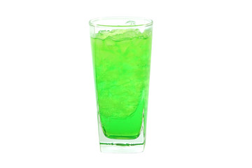 Refreshing green soda soft drinks with ice in a clear tall glass isolated on white background