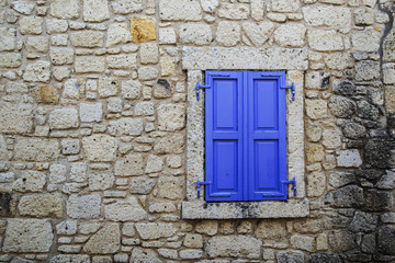 Old wall and blue window