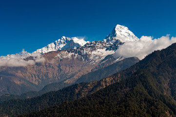 View of Fish Tail mountain or also know as Machapuchare in the Annapurna Himalayas of north central Nepal. It is revered by the local population as particularly sacred to the god Shiva.