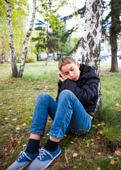 Teenager sleeping outdoor