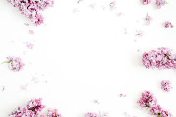 Frame of lilac flowers with space for text on white background. Flat lay, top view