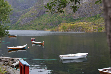 Obraz premium Beautiful view of boats, sea and mountains. Lofoten islands, Norway.