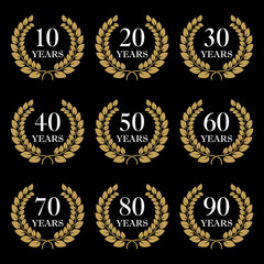 Anniversary icon set. 10,20,30,40,50,60,70,80,90 years design elements with laurel wreath symbol. Vector illustration.